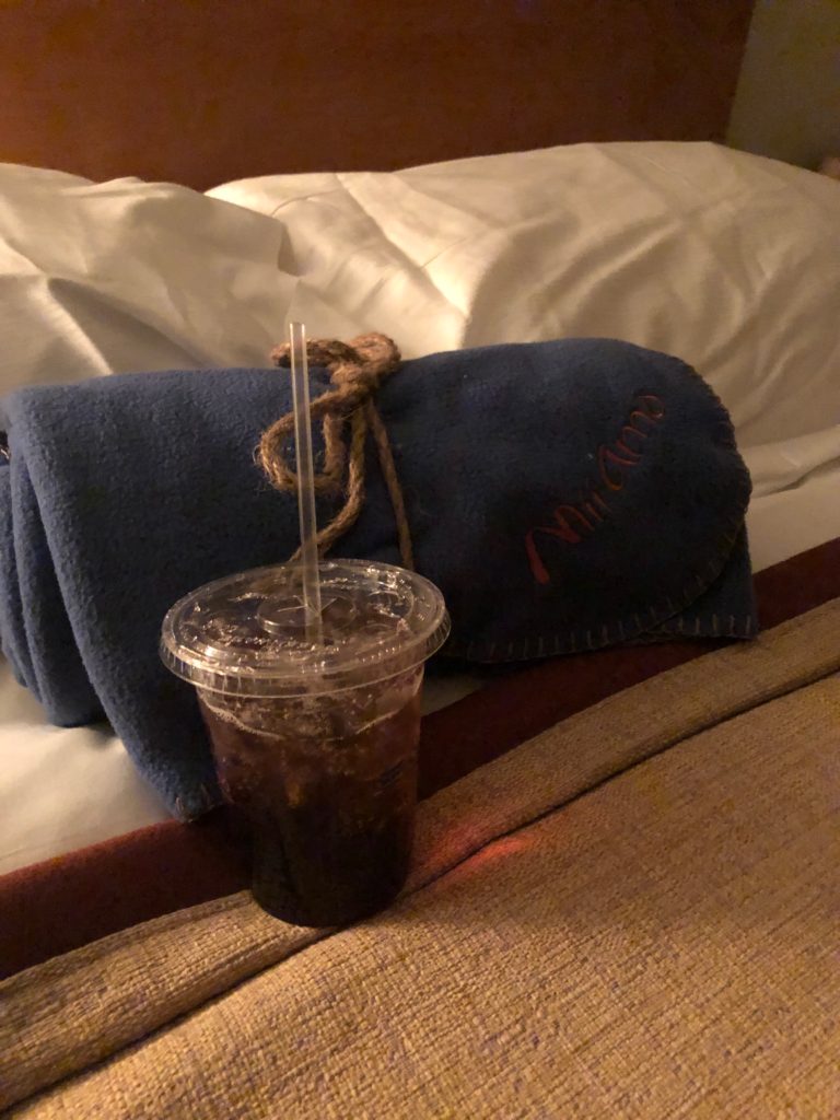 Sleep Tonic pictured on hotel bed.